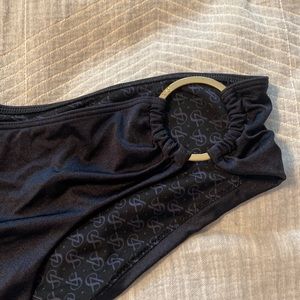 Victoria’s Secret bikini bottom black with gold ring on hip. Large